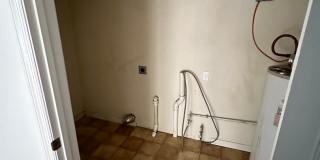 3 bedroom 1 bath house with a large back yard! Available August 2026 Gallery 7