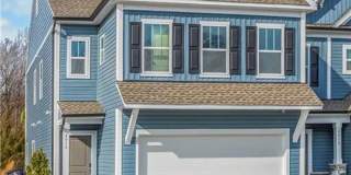 Spacious 3-Bedroom Townhome with Private Patio, Central HVAC & In-Unit Laundry Hookups Gallery 1