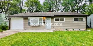 Lovely Three Bedroom Home in KCMO and an Updated Kitchen  w/ Granite and SS Appliances, including a Fenced Yard! Gallery 1