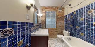 Large 4 Bedroom, 2 Bath House with Hardwood floors, walk in closets and more! Gallery 16