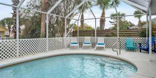 Gorgeous 4 bedroom pool house for rent w/ deeded beach access + pool & yard service included in the rent! Gallery 49