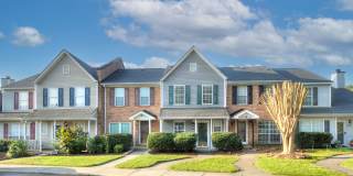 Discover this beautifully updated Raintree townhome featuring an open floor plan and a range of contemporary enhancements. Gallery 3