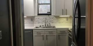 Midtown 2 story condo in Belleair Woods. Over 1200 sq ft of living space! Fenced in back yard! Pets are owner's approval, fees apply. Gallery 7