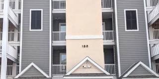 3BR/2BA First-Floor Condo in The Village at Queens Harbour Gallery 1