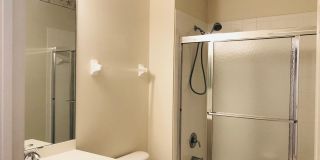 Experience Bell Tower Park. GATED ground floor 2 Bed 2 Bath Den 1 Car Garage Condo. Gallery 37