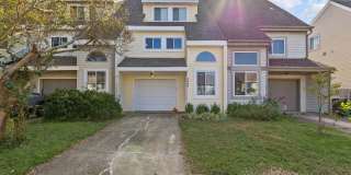 Discover your dream townhouse with stunning water views! Gallery 1