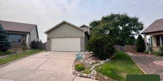 Spacious Home with Finished Basement and Fenced Backyard in 80923 Gallery 1