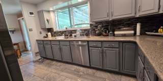 Spacious Ranch-Style 5BR Home w/ Finished Basement & Large Fenced Yard Gallery 4