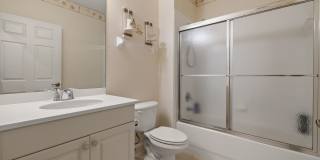 Experience Bell Tower Park. GATED ground floor 2 Bed 2 Bath Den 1 Car Garage Condo. Gallery 13