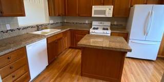 Harrison Place Condo is a beautiful property located on a quiet cul-de-sac. Gallery 3