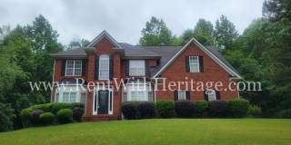 Gorgeous 3-Story Brick Home / 2 Fireplaces / Full Finished Basement / Chapel Hill Schools Gallery 1
