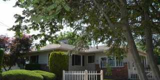 Large 4 Bedroom Orchards Home with private backyard! Gallery 1