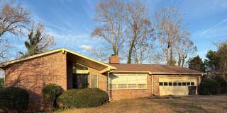 3 bedroom 2 bath Mid- Century style home! This home has a wonderful outdoor area great for Entertaining! Gallery 1