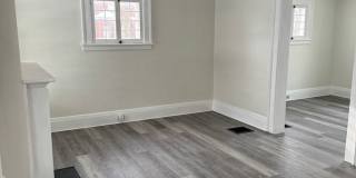 Single Family Home 3 bedroom 1 bath new paint flooring with basement fenced in yard Gallery 3