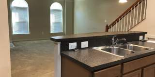 2 Level Townhouse/condo with one car garage in the Watkins Mill Town Center Gallery 9