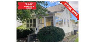 Charming 2-Bedroom Home with Porch and Garage! Gallery 1