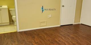 Beautiful 2/2/1 1150 Sq. Ft. with BONUS ROOM!!... tile & luxury plank flooring, Frest paint and a large fenced in yard! Gallery 18