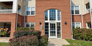 Bright Top-Floor Condo with Vaulted Ceilings and a Covered Balcony Gallery 1