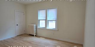 Large main floor duplex unit, Updated Kitchen & Bath, Full Dining Room w/Built-ins + Sunroom, garage stall Gallery 9