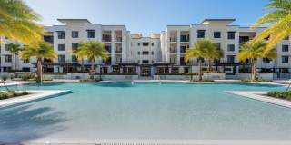 Annual Unfurnished Luxury Condo in Downtown Naples – 2BR + Den, 3 baths (2,1) at Eleven Eleven Central with Resort-Style Amenities  2 Garage Spaces Gallery 1