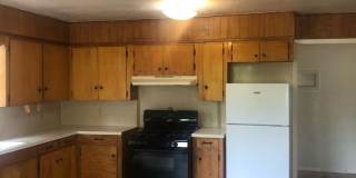 Huge 3 bedroom/1 bath upstairs apartment with Water, Gas Range and Refrigerator! Gallery 5