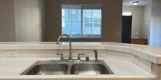 Great 2-bedroom 2 bath condo with A/C, 1 car garage and additional Gallery 1