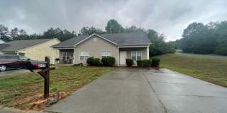 This two-story, 4-bedroom, 2-bath duplex in Fort Mill, SC sits on a corner lot Gallery 1