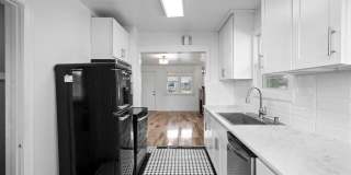 Remodeled 3BR/2BA Brick Bungalow - Fireplace, Finished Basement & Garage Gallery 1