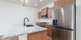 Row Home with 1 car garage 2 bed, 2.5 bath Gallery 1