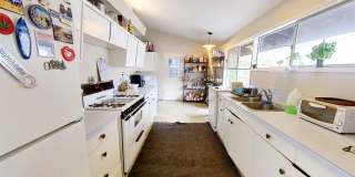 WALK TO SDSU! 5 bed 2 bath House w/ A/C Gallery 13