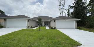BRAND NEW FENCED Beautiful 4-bedroom, 3-bathroom Duplex in Double LL section of Palm Coast Gallery 1