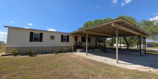 Amazing View / Fridge, Washer & Dryer Included / Fenced in Yard / Large front Deck with Carport / CISD Gallery 1