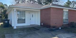 Charming Three Bedroom Two Bath Patio Home in Bay Pine Villas Gallery 1