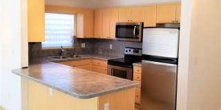 Beautifully maintained 2-bedroom, 2.5-bath townhome with a private fenced backyard and patio Gallery 3