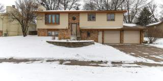 Spacious 5-Bedroom Split-Level in Southwest Sioux Falls with 4-Season Room & Fenced Yard! Gallery 1