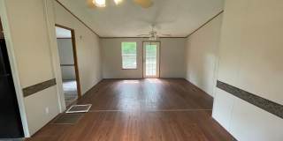 Looking for Acreage? This updated 3 bed, 2 bath home with an inside laundry room sits on 1.5 Acres of land. Gallery 1