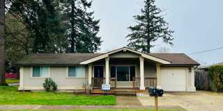 Spacious 4-Bedroom Home with Large Fenced Yard & Covered Patio Gallery 1