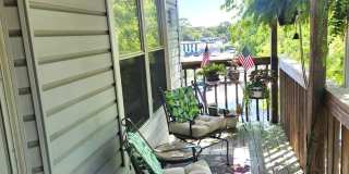 Top floor, corner unit condo off Shore Drive just two blocks from the bay! Gallery 1