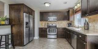 {5611} Updated OP Ranch + Two Car Garage + Fenced Yard and Stamped Concrete Patio Perfect for Spring BBQs Gallery 14