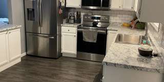 Beautifully updated with modern upgrades and cozy charm. PETS WELCOME Gallery 24