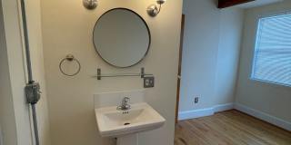 Charming 1928 Row Home for Rent with Modern Amenities — 3 Bedroom 2 Full Bath w/ 2 Half Baths, 2 Kitchens, located in Kingman Park, Near DC Armory & Eastern Market Gallery 42