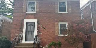 3-Bedroom Brick Home with Hardwood Floors and Finished Basement Gallery 1
