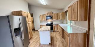 Beautifully Updated 5 Bedroom Rockrimmon Ranch Home Backing to Open Space Gallery 7