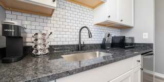 Funky Firehouse Renovated into Modern 2 BDR/1 Bath Gallery 14