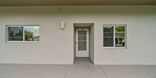 first-floor unit featuring a 2 bedroom, 2 bath fully furnished Gallery 4