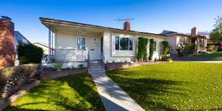 3 Bedroom Long Beach Home on with Large, Low-Maintenance Front and Backyard Gallery 1