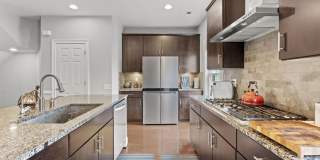 Welcome to 9618 Stockwell Lane—an exceptional 3-level, 4-bedroom, 3.5-bath townhome in the heart of Fairfax that has been thoughtfully updated to offer both style and functionality. Gallery 11