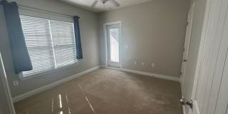 Don't miss this 4-bed, 3-bath condo TWO miles from the ocean! Gallery 39