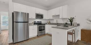 Simple living?  We got you.  $1150/mo water and laundry included in this 1 BR condo. Gallery 1