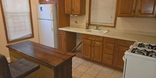 5BR/1.5BA Row Home with Backyard and Laundry Hookups Gallery 12